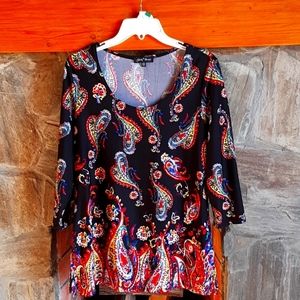 Slinky Brand MP pull over top with black, red, yellow, blue, green and white.